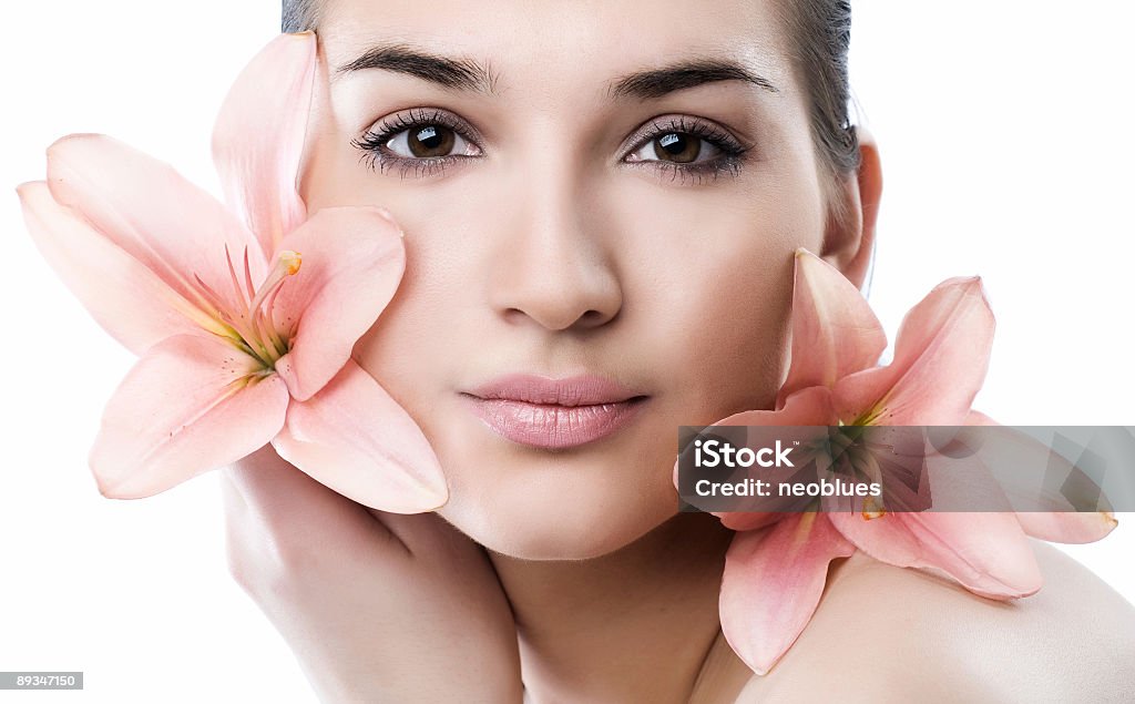 Visage de femme avec fleur - Photo de Adulte libre de droits