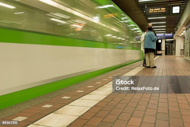Passengers And Green Subway Train In Motion Blur Stock Photo - Download Image Now - Hanover - Germany, Blurred Motion, Business