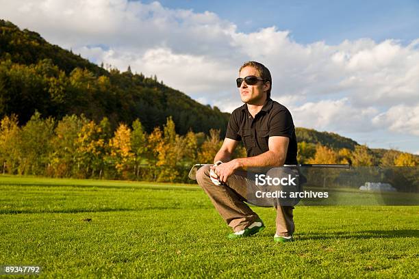 Golf Player Reading The Green Stock Photo - Download Image Now - Golf Ball, Adult, Authority