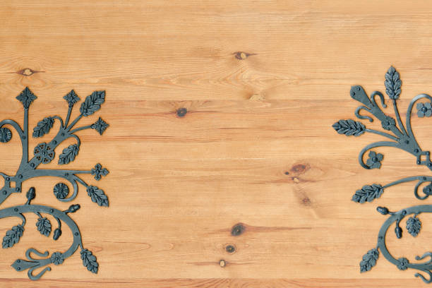 istock Wooden door with wrought metal elements 893478396