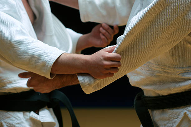 Judo fight Judo fighters sparring off in a battle of body and mind  judo stock pictures, royalty-free photos & images