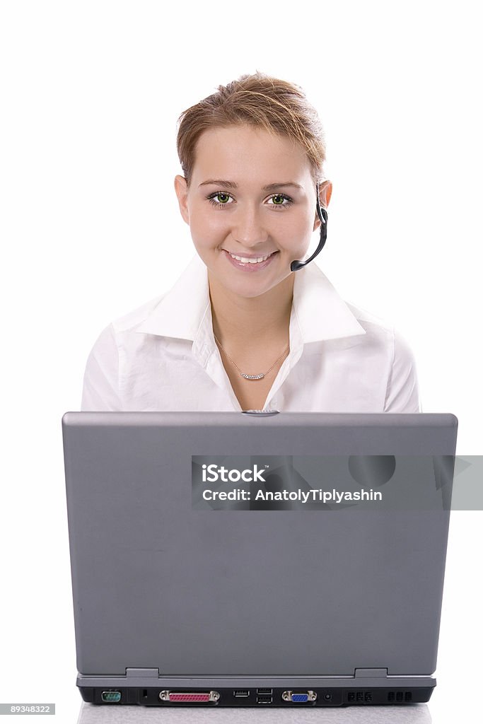 Giovane bella ragazza con laptop operatore - Foto stock royalty-free di Affari