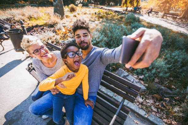 istock Happy young mixed race couple spending time with their daughter - 893486708
