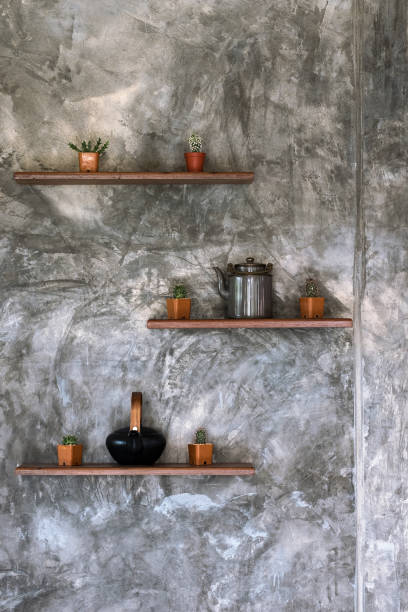 istock Concrete wall background texture grunge and grey surface with shelves and accessories, empty space for add text or image. Loft style. 893489560