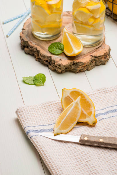 istock Lemon and lime slices in jars 893489682