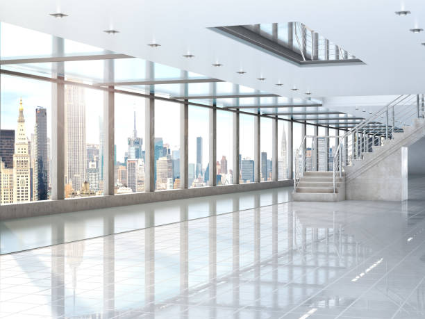 istock large white hall where there is a panoramic window, a staircase to the second floor. Building under the shopping center, office. 893493780