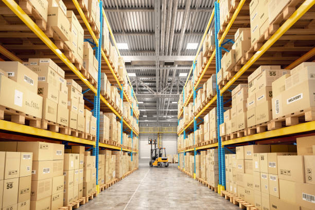 concept of warehouse. the forklift between rows in the big warehouse - warehouse imagens e fotografias de stock