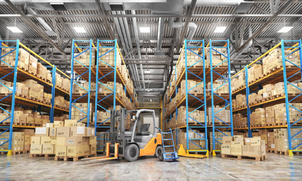 istock Concept of warehouse. The forklift between rows in the big warehouse. 893496314