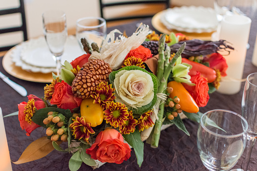 Thanksgiving floral arrangement with flowers and vegetables