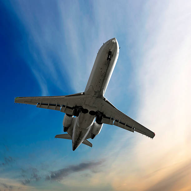 istock corporate jet airplane landing at dusk 89350033