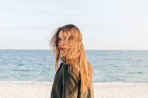 Beautiful young woman with long brown hair