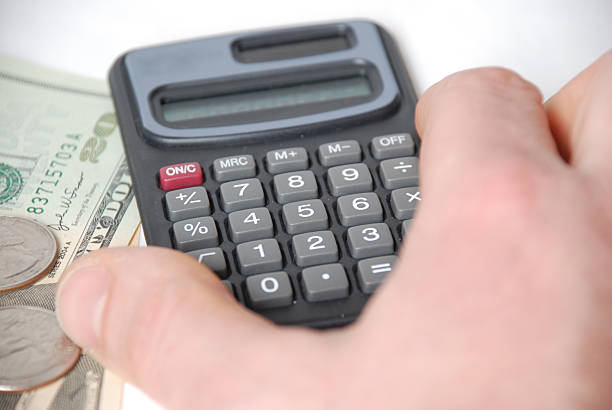 kalkulator - penny coin human finger human thumb zdjęcia i obrazy z banku zdjęć