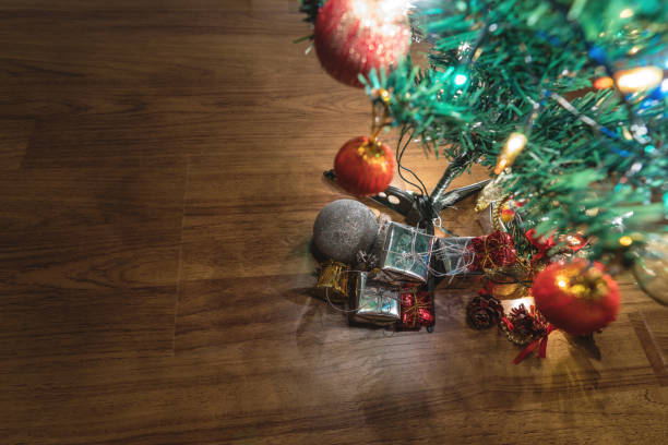 istock hristmas trees with gift boxes and decorations on wooden floor 893510008