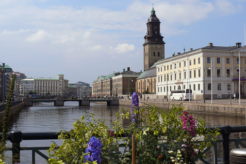 Several modern waterfront apartment blocks in Stockholm, Sweden, in warm September sunshine.