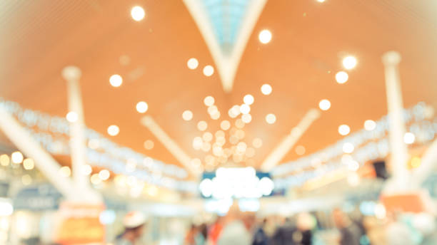 istock abstract blur image of walking way inside modern building with defocused for background usage . (warmed tone) 893521690