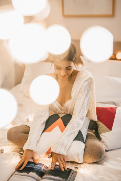 istock Senusal woman reading magazine 893522042