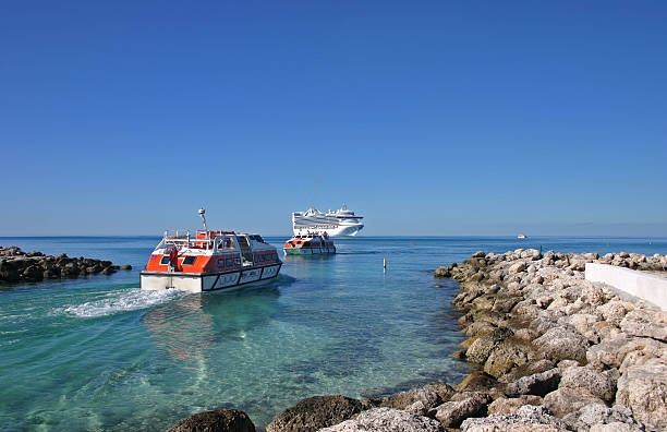 motor boat in the sea. Top view of the boat. Top view of a white boat sailing in the blue sea. A boat with a motor on blue water.