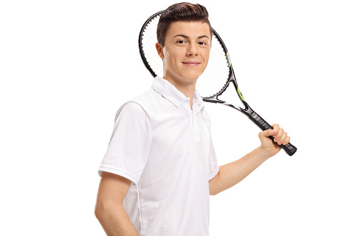 Teenage tennis player with a racket isolated on white background