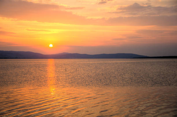 istock Sunrise at the lake 893525586