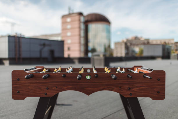 istock table football on roof 893525860