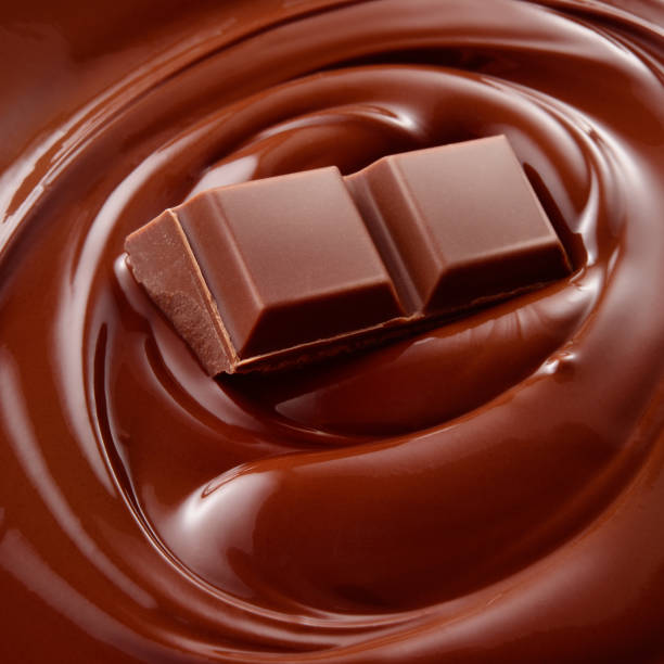 istock Chocolate bar in hot chocolate wave. Chocolate background 893528716