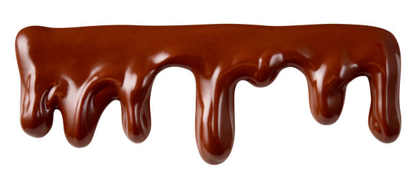 istock Stream of chocolate. Melted chocolate. Chocolate streams with drops isolated on white. With clipping path. 893528960