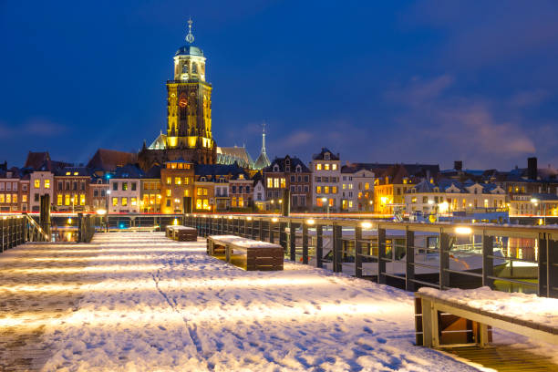 istock Skyline of Deventer at the river IJssel during a cold winter evening 893529548