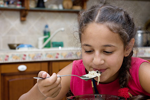 istock Girl eating soup. 89353255