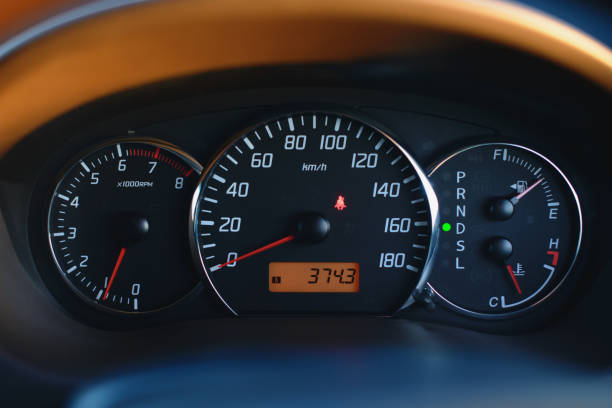Car dashboard with speedometer and tachometer in black color, close up. Car dashboard with speedometer and tachometer in black color, close up. kilometer photos stock pictures, royalty-free photos & images