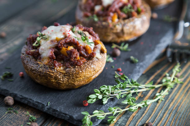 istock Stuffed mushrooms with beef cheese and spices 893534552