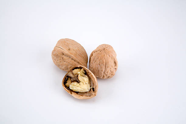 cracked walnuts 2 stock photo