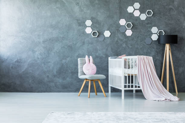 istock White cradle in baby's room 893543546