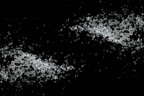 water splash isolated on black water splash isolated on black. flushing water stock pictures, royalty-free photos & images
