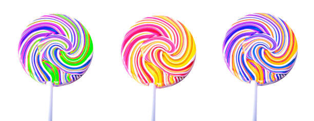 istock Caramel candy figured on a stick isolated on a white background 893547890