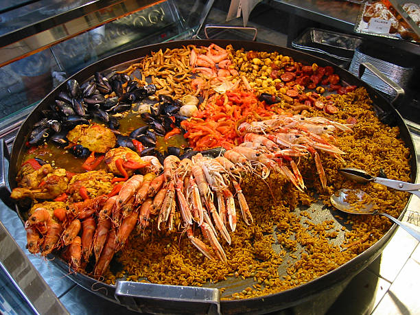 giant paella on a market - fsachs78 stockfoto's en -beelden