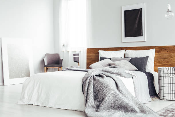 istock Simple bedroom with dark poster 893560648
