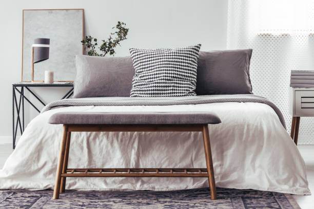 istock Wooden bench against white bed 893560650