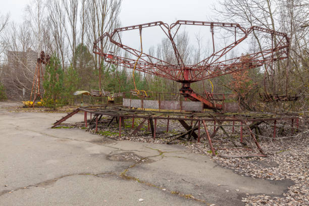 istock Attraction in amusement park in overgrown ghost city Pripyat. 893561296