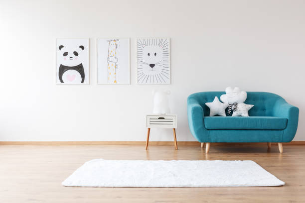 istock Aquamarine sofa in kid's room 893561408