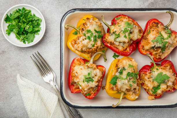 bell peppers stufed with meat,  vegetables and cheese stock photo