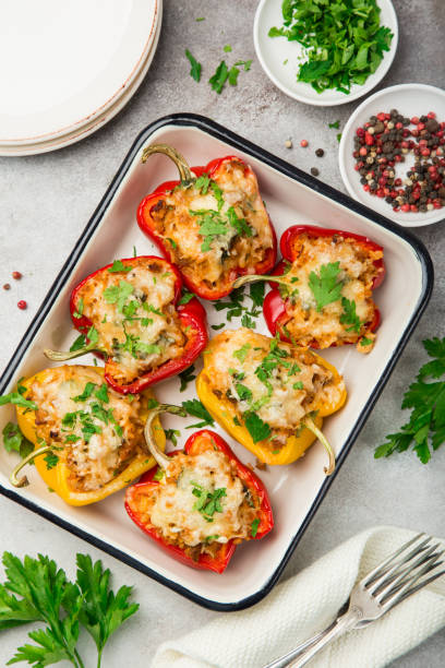 istock bell peppers stufed with meat,  vegetables and cheese 893561832