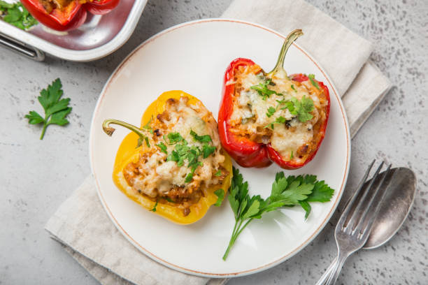 istock bell peppers stufed with meat,  vegetables and cheese 893561842