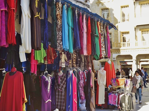 Dresses store on the Place de la Victoire, at the entrance to the souk and Medina of Tunis, Tunisia, North Africa.