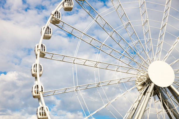istock Cab of the Ferris wheel against the sky 893576716