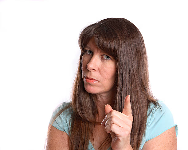 istock Middle age woman pointing her finger 89357853