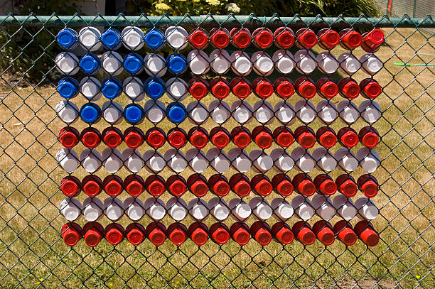 US flag made of cups in a fence stock photo