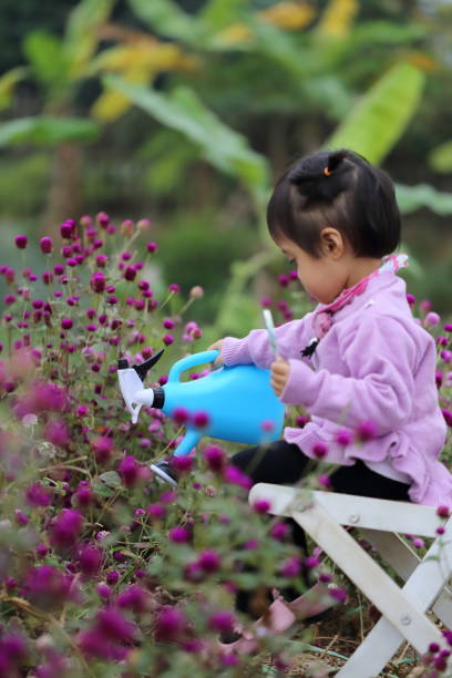 istock 2years old girl helping her parent 893581274