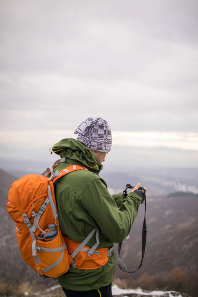 istock Photographer hiker in nature 893581390