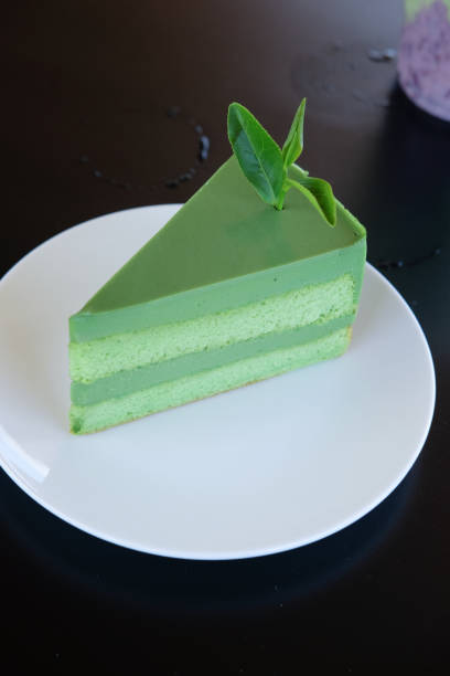 istock Japanese matcha green tea cake with tea leaf 893581702