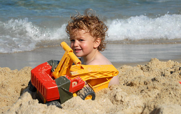 Cтоковое фото Пляжный мальчик с Digger